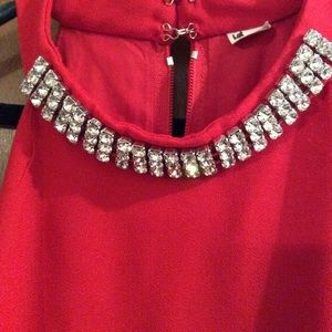 Long red strapless formal or semi-formal dress